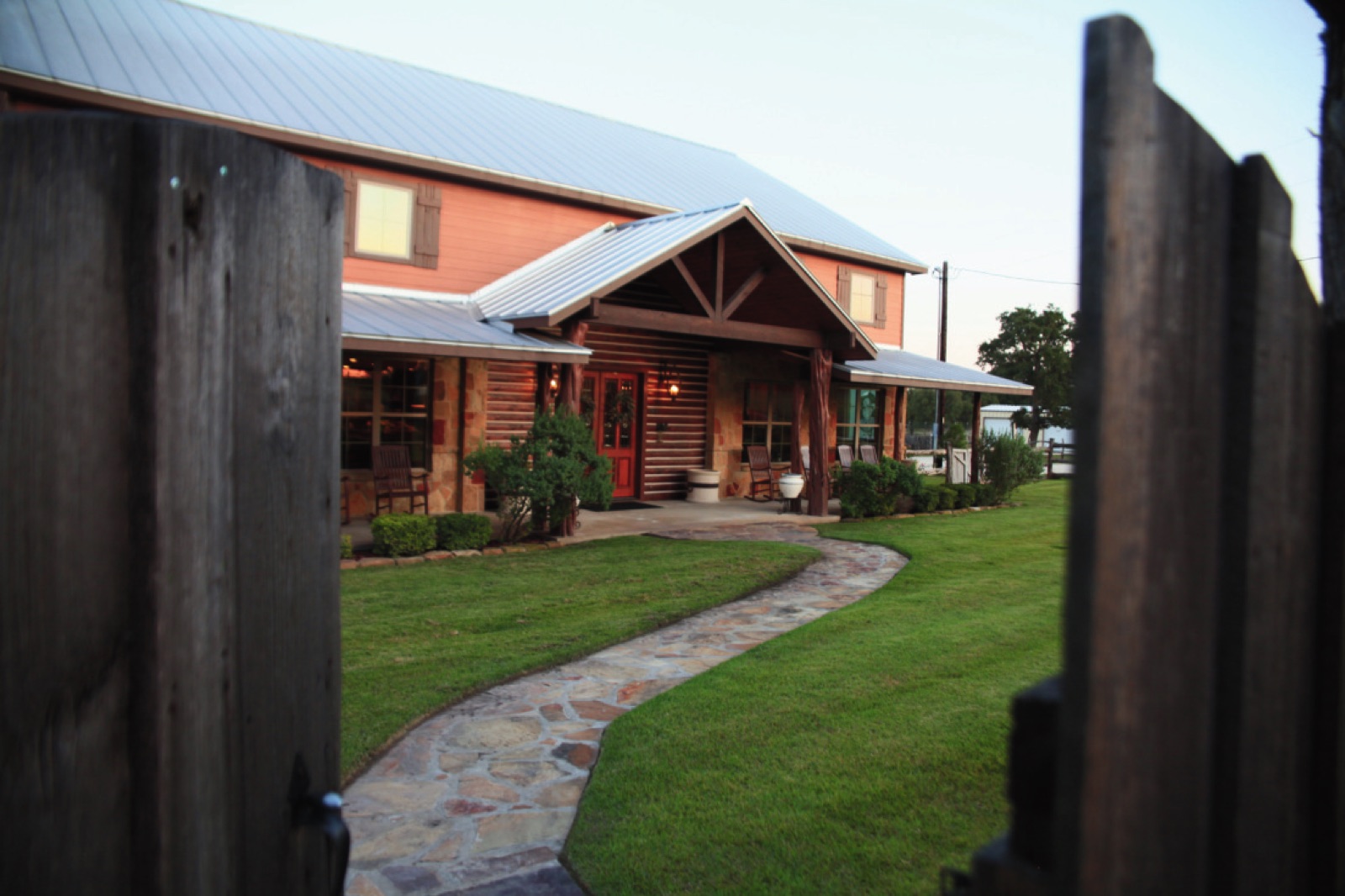 JDG Ranch Lodge exterior and stone walkway